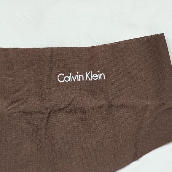 NWOT CALVIN KLEIN INVISIBLES THONG PANTY IN DARK BROWN SIZE EXTRA LARGE - Picture 3 of 4
